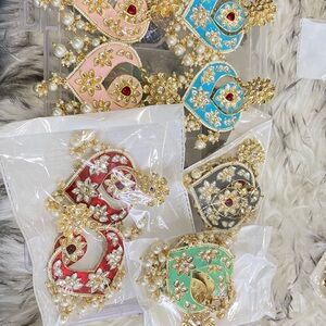 Red and Gray Filigree Earrings with Rhinestone Embellishments